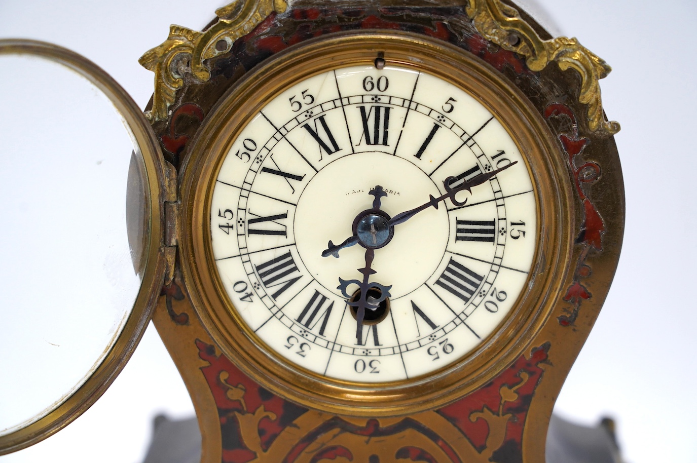 A Boulle work mantel clock with metal mounts, 30cm high. Condition - not checked for time keeping, case good